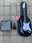 Squier Stratocaster Electric Guitar Pack Black W/ Frontman 10G Amp, Accessories. Fixed Price $250.00.