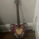 Rare Daisy Rock Electric Butterfly Guitar. Fixed Price $400.00.