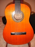 Vintage 1970S Japanese Made Taka TATG-300 Classical Guitar W/ Brandnew Hard Case. Fixed Price $400.00.