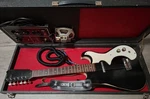 Silvertone 1448 Electric Guitar With Built-in Tube Amp Case. Fixed Price $350.00.