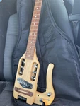 Traveler Guitar Electric Natural Maple 6 String With Gig Bag. Fixed Price $600.00.