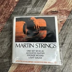 New Martin Strings Set M140 (6) Acoustic Guitar Bronze Light Gauge. Fixed Price $29.99.