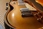 Electric Guitar Gibson Les Paul Gold Top Deluxe Vintage 1970 With Hard Case. Fixed Price $14320.00.