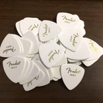 (72 Pack) Fender Heavy White Celluloid Shape Guitar/bass Picks 198-0346-580. Fixed Price $27.00.
