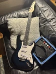 Ritmo Electric Guitar Starter Pack W/ 20W Amp & Cable Strat Style. Fixed Price $130.00.