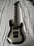 Jackson Series Dinky Minion JS1X- Electric Guitar- Silver Burst. Fixed Price $150.00.