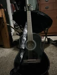 Indiana Pinto Black Acoustic Guitar With Ying Yang Strap. Fixed Price $190.00.