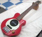 Pignose PCG-100 Mini Electric Guitar With Built-in Amplifier. Fixed Price $255.99.