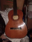 Gremlin Classical Guitar 6 String Standard Body Brown. Fixed Price $60.00.