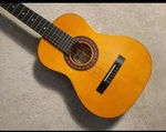 Montana Guitar CL-12; 1/2 Size, Used, Small Body Classical, With Nylon Strings. Fixed Price $55.00.