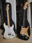 Squire Electric Stratocaster Type Black And White With Case & Amp. Fixed Price $425.00.