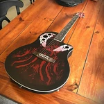 Red Acoustic Electric Guitar, Full Size With Cutaway, Round Abs Back, Gig Bag. Fixed Price $99.99.