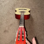 Zeny Classical Guitar Red 6 String Right-handed Standard Body 19 Frets. Fixed Price $48.00.