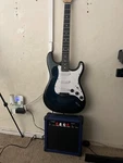 Segawe OFW-Y01-1206A-2 Beginner Electric Guitar With Amp. Fixed Price $175.00.