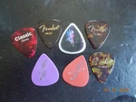 7 Used Guitar Picks: 3 Fender Heavy, 2 First Act, My Girls, D'addario Classic. Fixed Price $7.99.