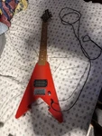 First Act ME279 Red Flying V Electric Guitar Tested W/ Cable. Fixed Price $60.00.