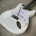 Full-size Olympic White Electric Guitar With Rosewood Fretboard, S-s-s Pickups. Fixed Price $85.95.