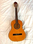 Kids Laurel LN-75ACOUSTIC Guitar With Wolfpak Case-- Used, Good Condition, Brown. Fixed Price $42.00.