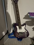 Washburn Purple Hannah Montana Secret Star Disney 3/4 Electric Guitar. Fixed Price $140.00.