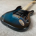 Full-size Dark Blue Strat Style Electric Guitar Package With Gig Bag And More. Fixed Price $85.95.