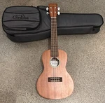 Is Cordoba Ukulele Musical Instrument Model 20CM Brown With Case. Fixed Price $98.50.