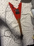 First Act ME279 Red Flying V Electric Guitar Tested W/ Cable. Fixed Price $65.00.