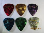 6 Pack First Act Celluloid Guitar Picks, Medium Gauge Thickness #147. Fixed Price $7.95.