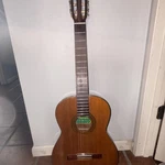 Diasonic Classical Guitar 4/4 Brown 6 String 19 Frets Right-handed. Fixed Price $150.00.