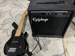 Epiphone Les Paul 6-STRING Electric Guitar And Amplifier. Fixed Price $150.00.