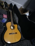 Salvador Ibanez Eletric Classical Guitar 6 String Brown Wood W/ Gibson Case. Fixed Price $300.00.