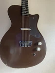 1961 Danelectro Silvertone U1 Electric Guitar. Fixed Price $700.00.