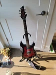 Schecter Guitar Research DEMON-6 Electric Crimson Red Burst. Fixed Price $185.00.