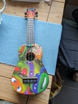 Nickelodeon Teenage Mutant Ninja Turtles Mean Green Ukulele With Bag. Fixed Price $33.32.